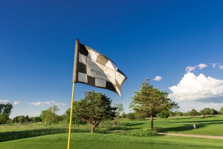Checkerboard flag on golf course